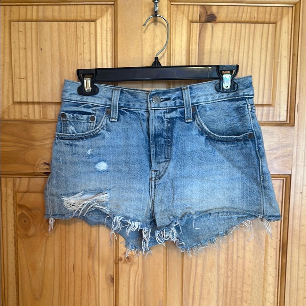 Levi’s 501 blue distressed Jean shorts